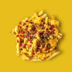 papas-a-la-francesa-con-queso-cheddar-y-trocitos-de-tocino